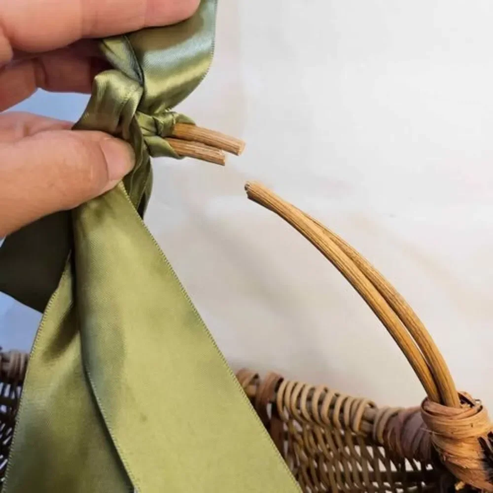 Wicker Basket with Green Ribbon, Broken Handle. Flat side. Wall decor